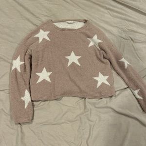 Light pink sweater with stars